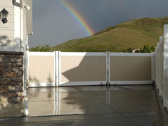 Entrance gate and parking pad.