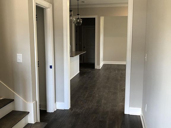 Main entry facing towards the kitchen and living room.
