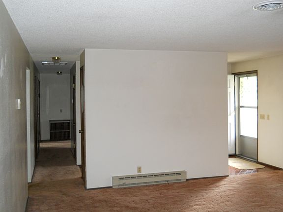 Living room to front door & hallway