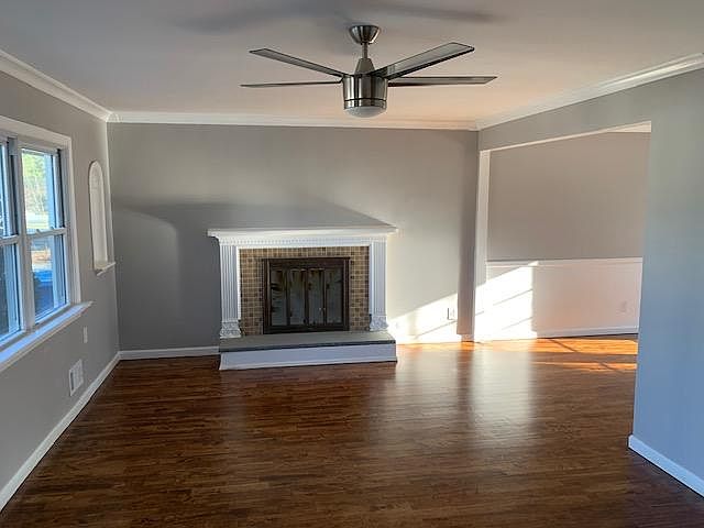 Living Room with Fireplace plus hardwood floors throughout