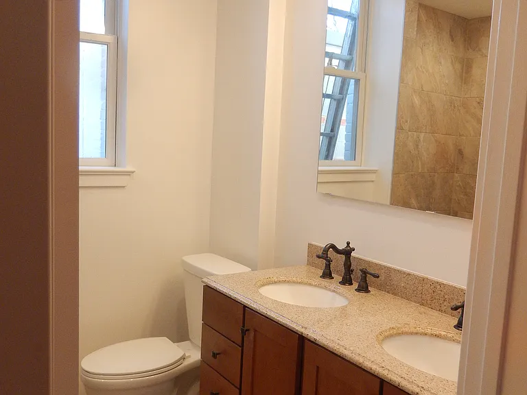 Double sink, shared amongst two roommates on second floor.
