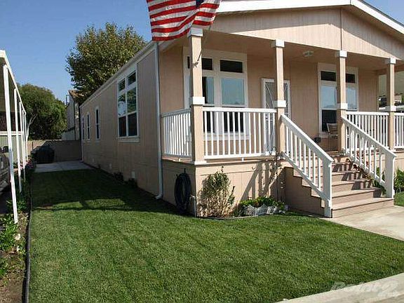 Front with beautiful side yard
