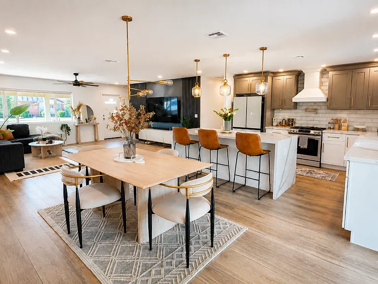 high-end furnishings - west-elm rugs, West elm table, gold-finishes, marble countertops. This isn't your ikea furnished airbnb