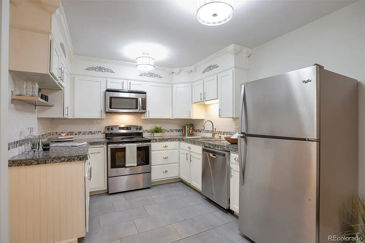 Building Photo - 9625 E Center Ave #11A