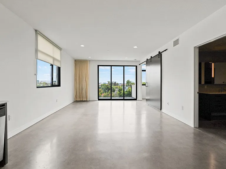 Open-Concept Kitchen, Dining, and Living Room Areas