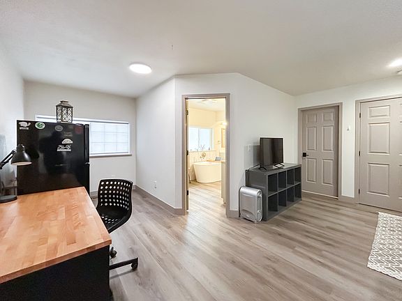 Private en-suite entrance to luxurious remodeled bathroom.