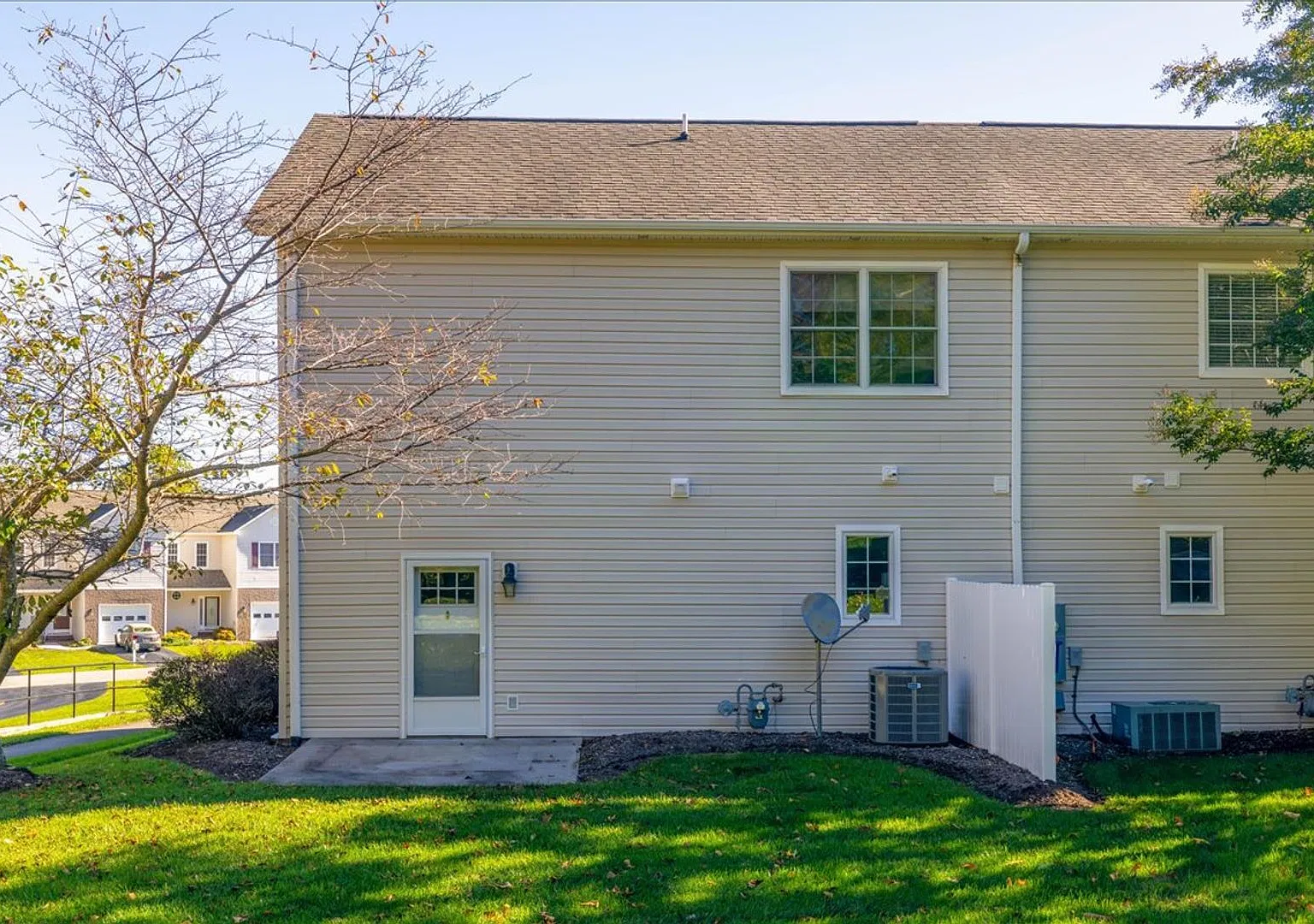 End-Unit Townhome with Open Backyard in The Orchards — Photo 2
