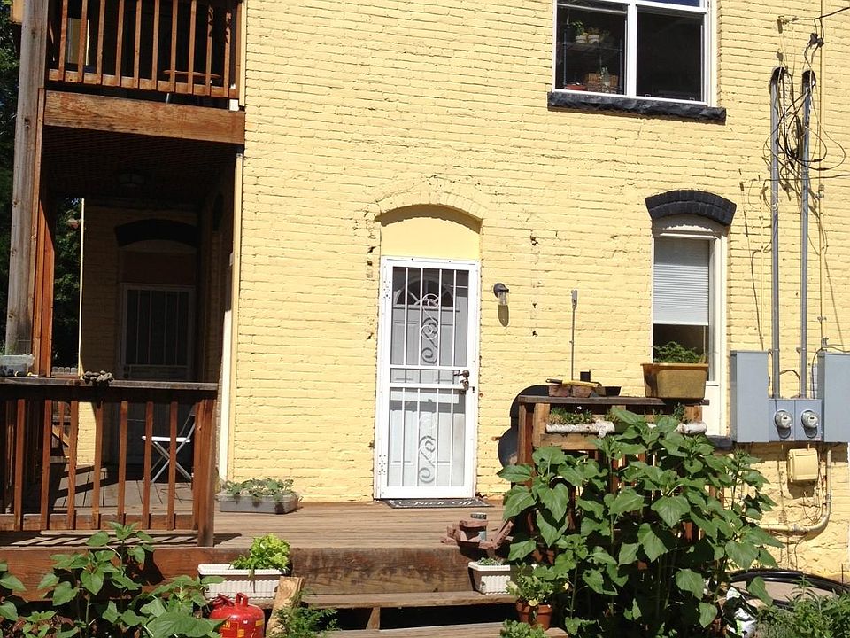 Back yard and view of balcony