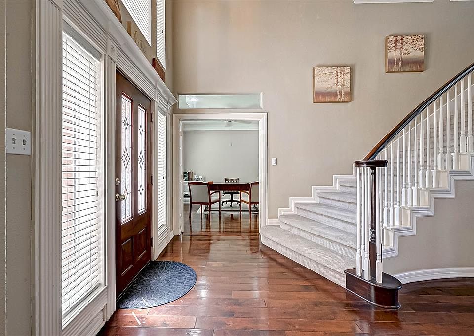 As you walk in you will be facing the stairs with the study to your left and formal dining room to your right.