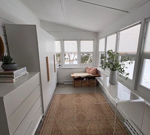 Sun porch ( Cabinets below to current tenant )