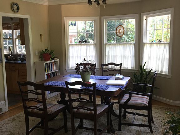 Dining room with bay window. Doorway to kitchen.