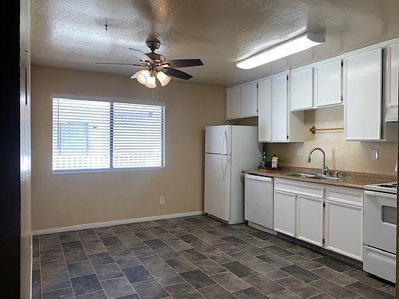 Dine-in kitchen with lots of storage and great natural light.