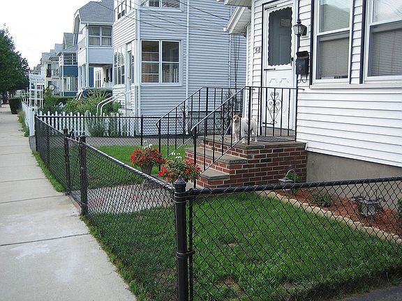 Main entrance stairs repaired and fence painted 
