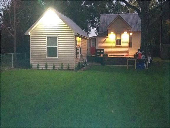 Night View of Farmhouse and Guest House