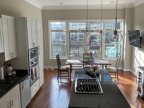 Kitchen and Dining with balcony
