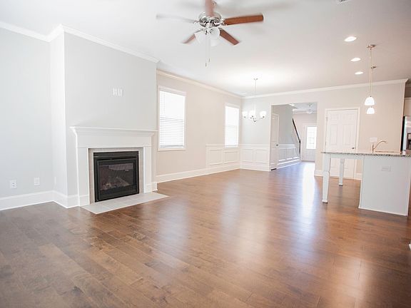 Open floor plan with fireplace, perfect from entertaining!