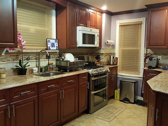5th image of 93-49 208 Street