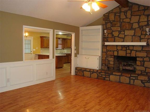 Living room towards dining and kitchen