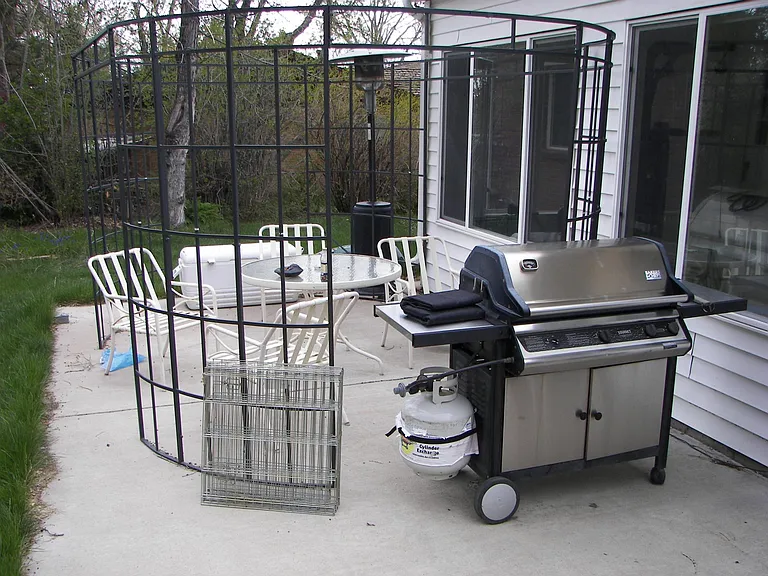 Back Porch, with gazebo, patio chairs and table, BBQ Getting