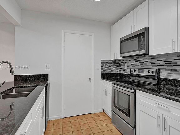 5th image of 7692 S Oakmont Cir