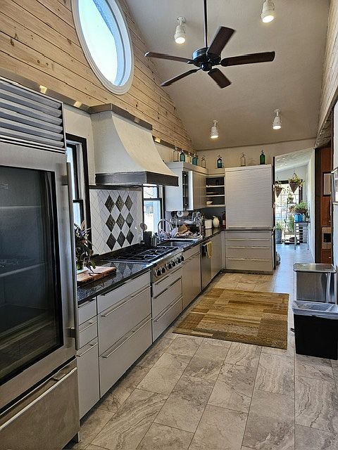 From the garage walk into the kitchen with the subzero and high end appliances