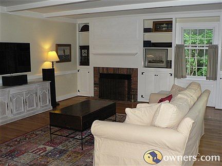 Family room with wood burning fireplace