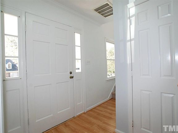 Entry Foyer has Laminate Flooring, Coat Closet & has stairs to the 2nd Level.