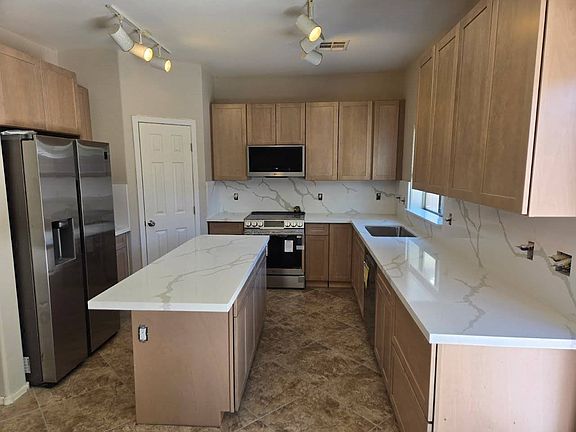 Quartz Kitchen 
New Range - Microwave - Dishwasher - Cabinets & Quartz Countertops