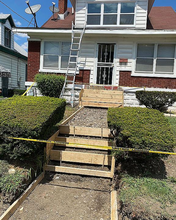 Front of house during rehab