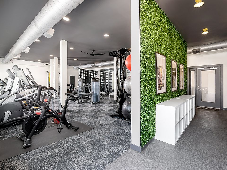 24-Hour Cardio and Strength Training Fitness Center featuring Peloton Bike, Hub Training System, Water Rower, Free Weights and More!