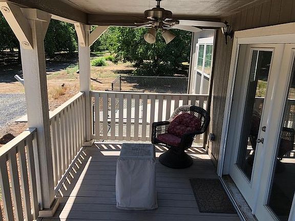 Covered patio off the kitchen with french door entry.