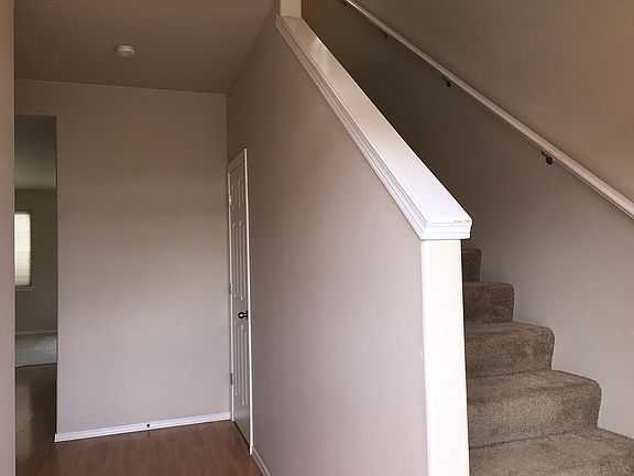Stairs off front entry 
