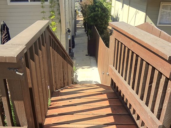 Separate entrance from the street, along the side of the mai