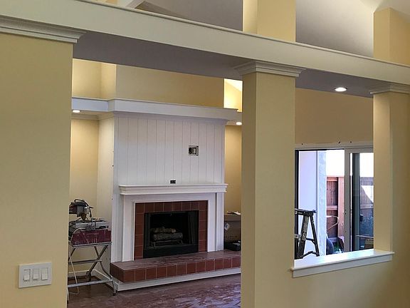 Living Room with Gas Fireplace, Millwork, TV Provisons Over Mantle; Surround Sound System