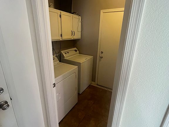Laundry room with washer and dryer.
