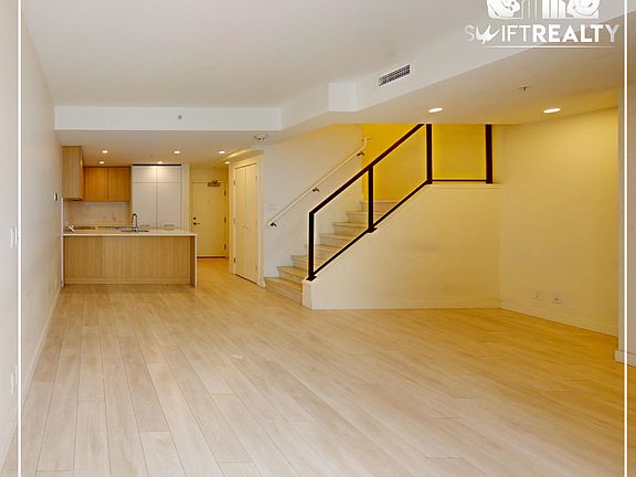 03_TH17-13318 104 Ave_Spacious Living Room_06272025