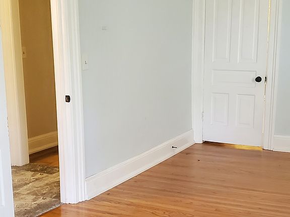 Master bedroom is at the right of the stairs. View from front corner.