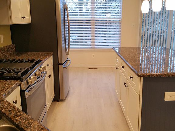 All new SS appliances, Shaker style cabinets & granite countertops
