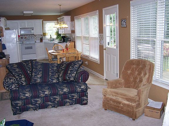 Fablous open floor plan of kitchen and family room.  Door leads to deck.
