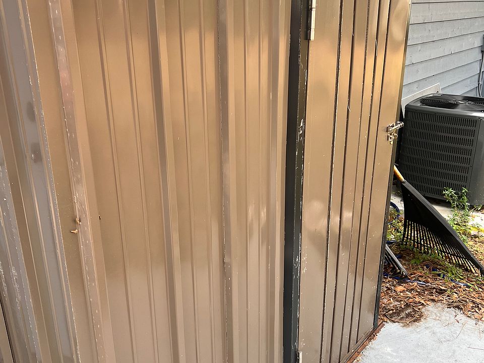 Shed with GE Washer/Dryer combo.