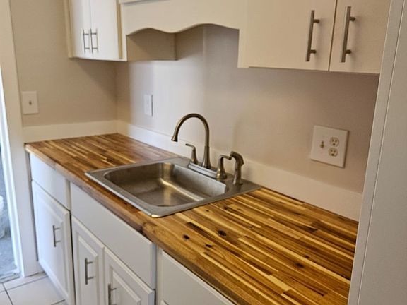 Kitchen with door to garage