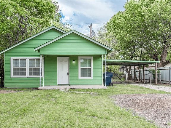 Front of house with covered porch