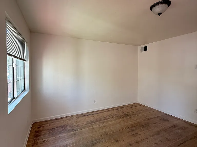 Living room with Two Large Windows with New Shades