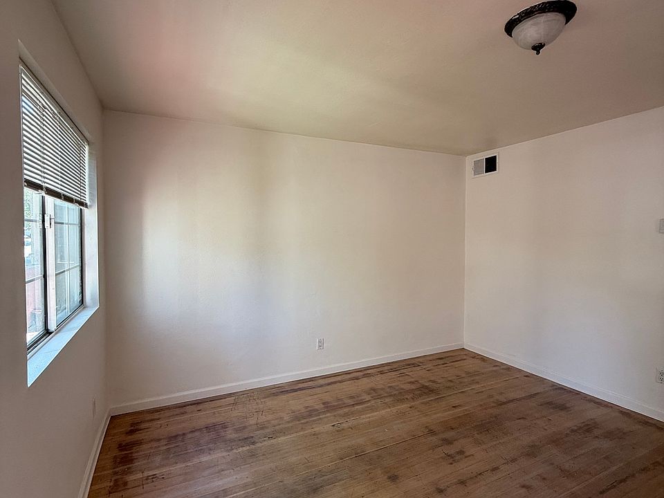 Living room with Two Large Windows with New Shades