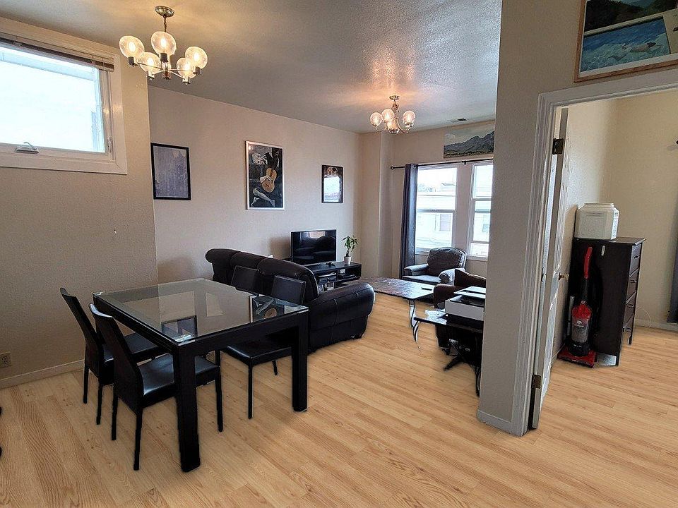 Dining area and family room with bedroom 2 to the right.