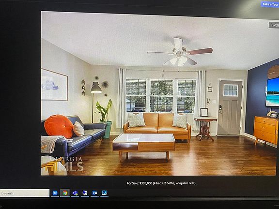 Spacious living room with lots of great light