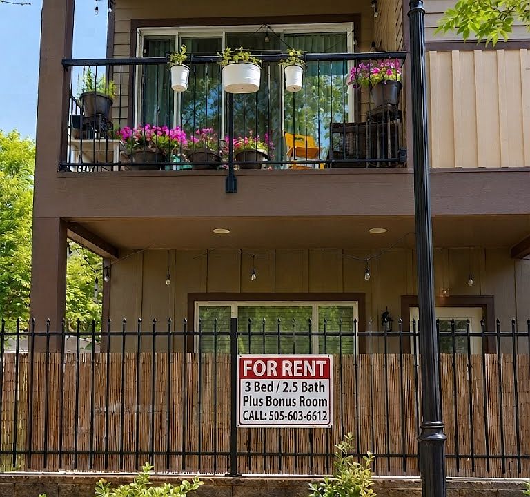 Front Entryway with patio on the first floor and balcony on the second floor