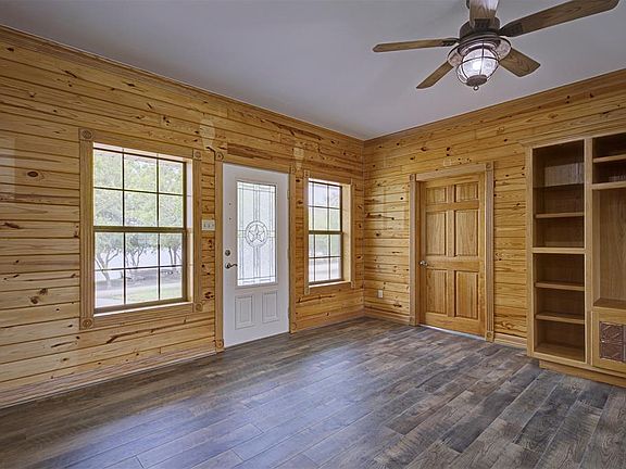 View of the living area looking towards the front door.