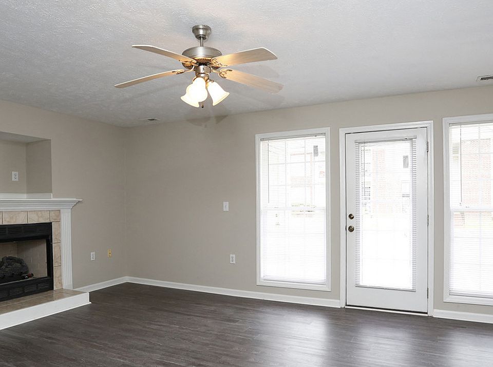 Enjoy plank style flooring and a warm fireplace at your new home
