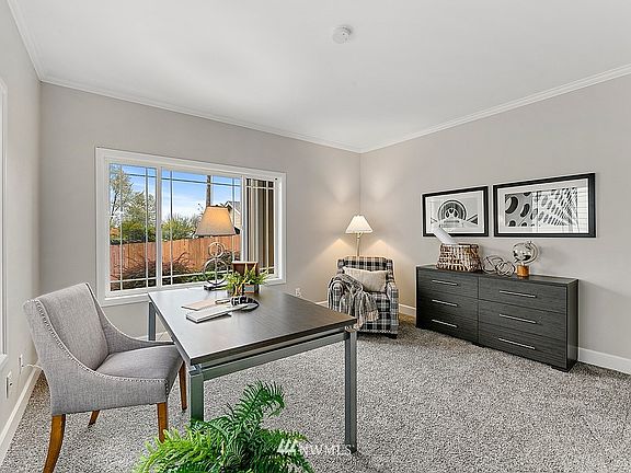 Flex Space off entry perfect for a living room or home workspace. 